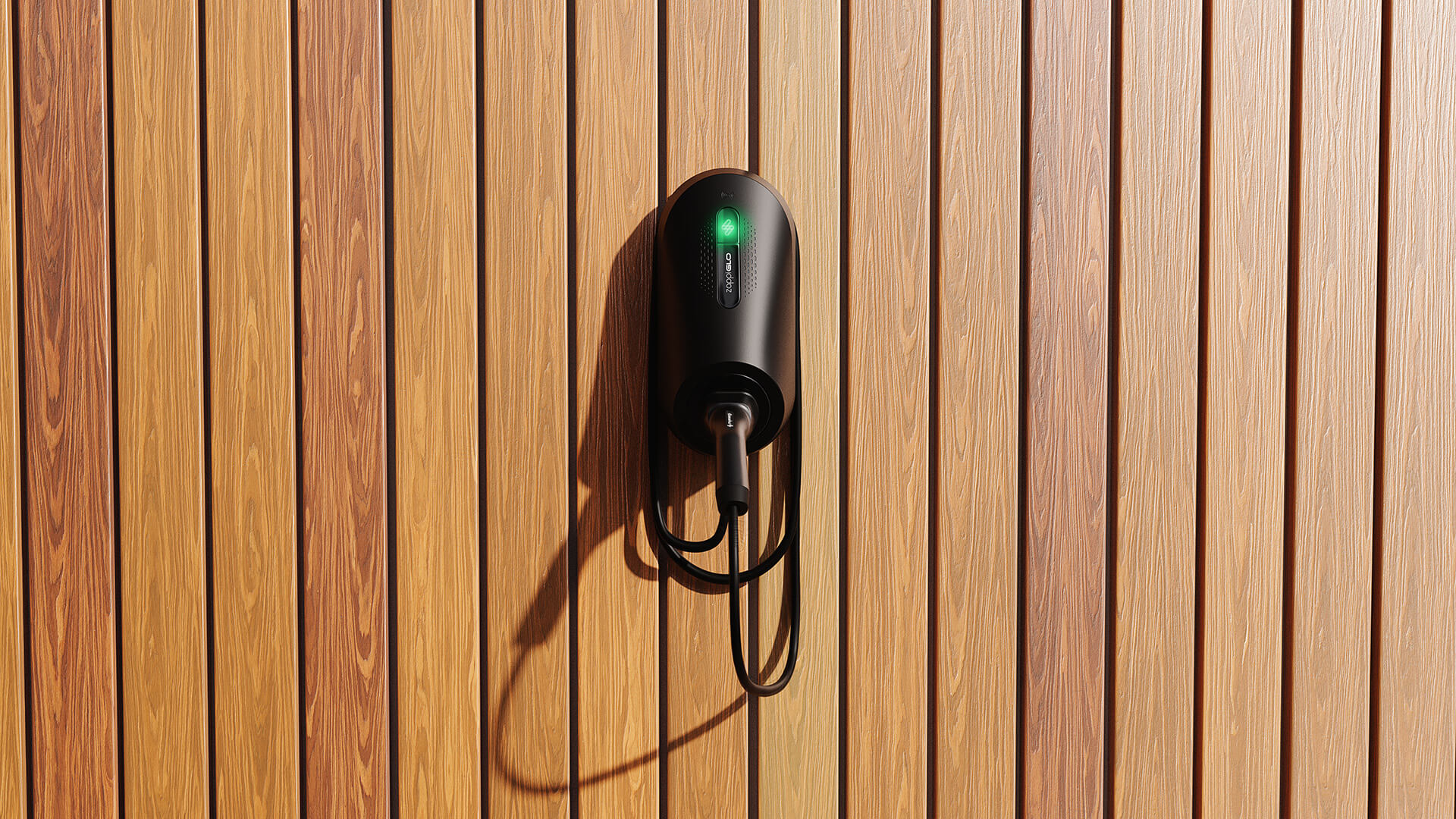 MyEnergi Car charging port with cable attached to a wooden wall