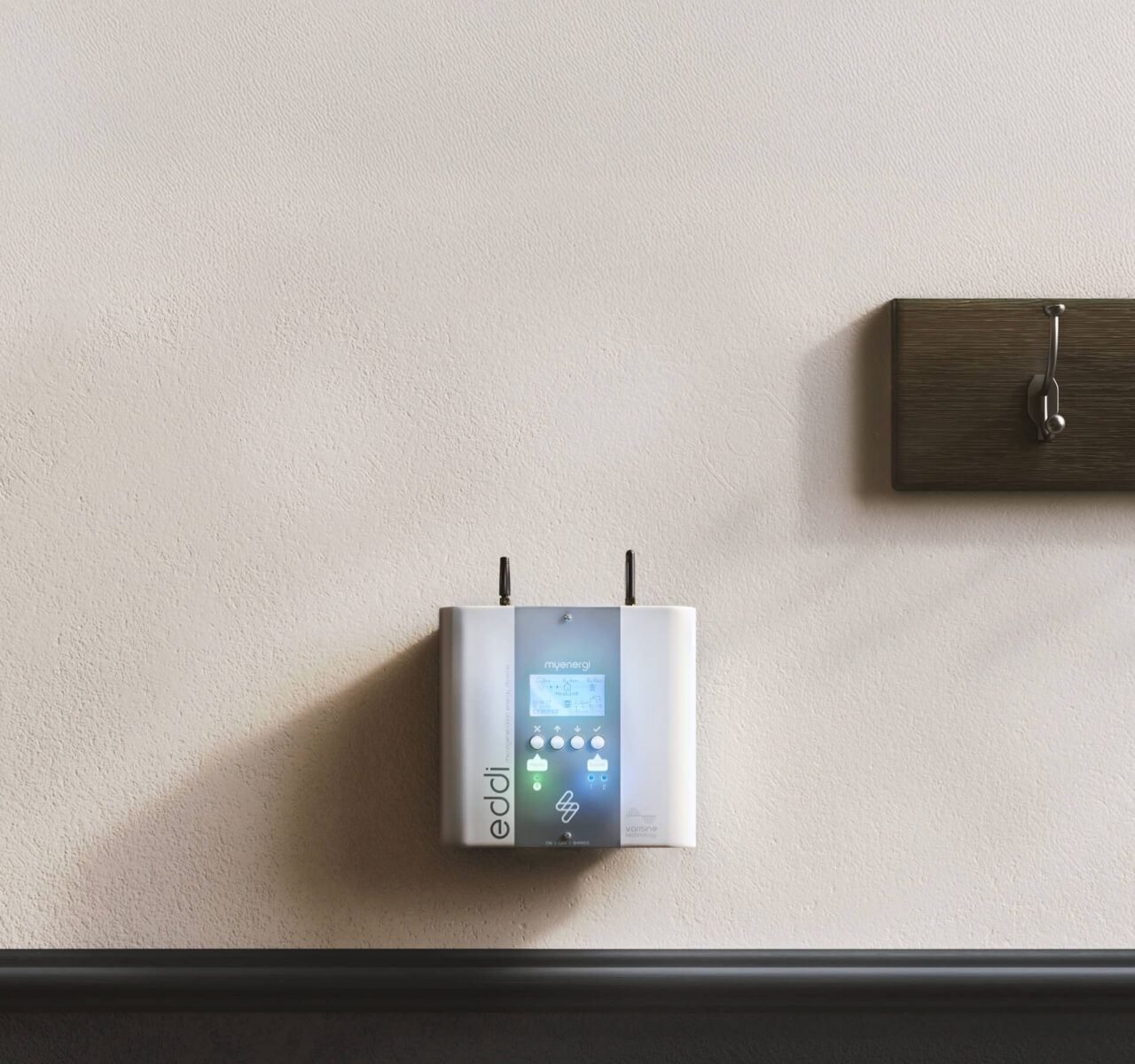 Photo of MyEnergi microgeneration energy diverter in place on a hallway wall